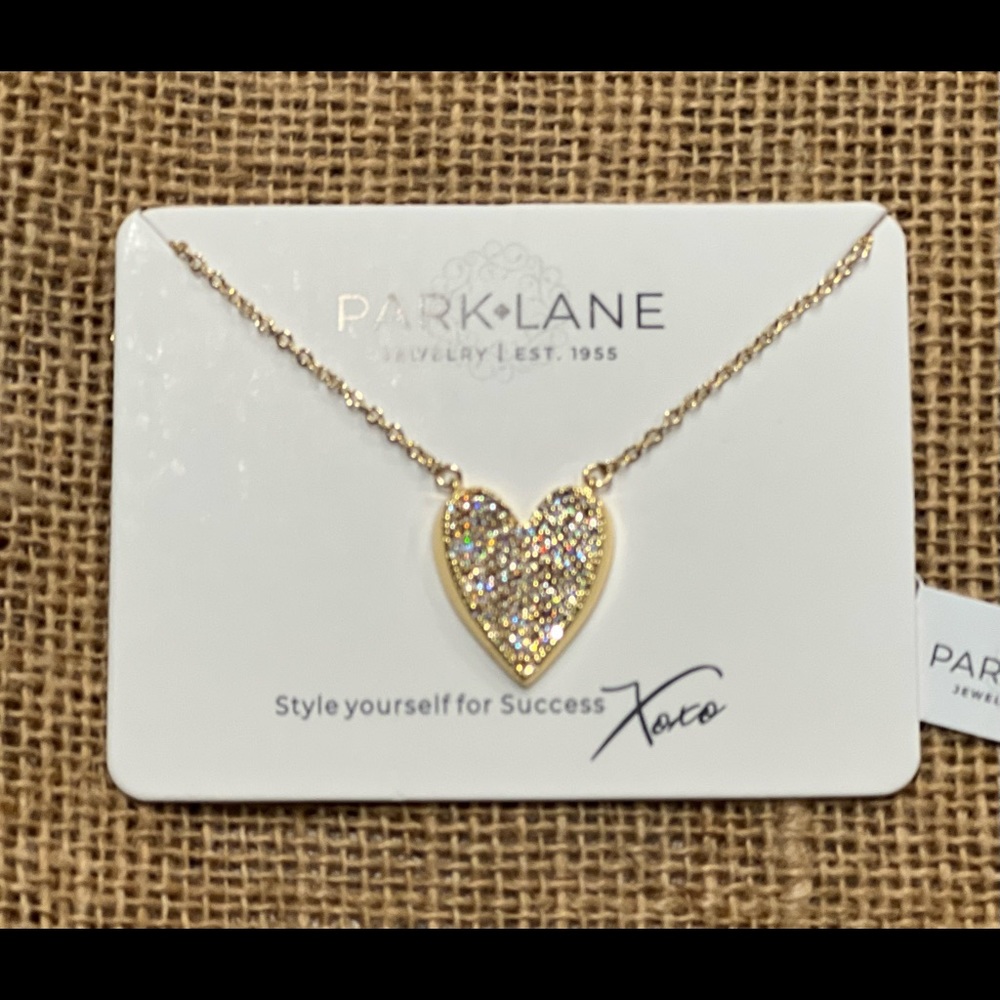 CZ encrusted sold tone heart necklace